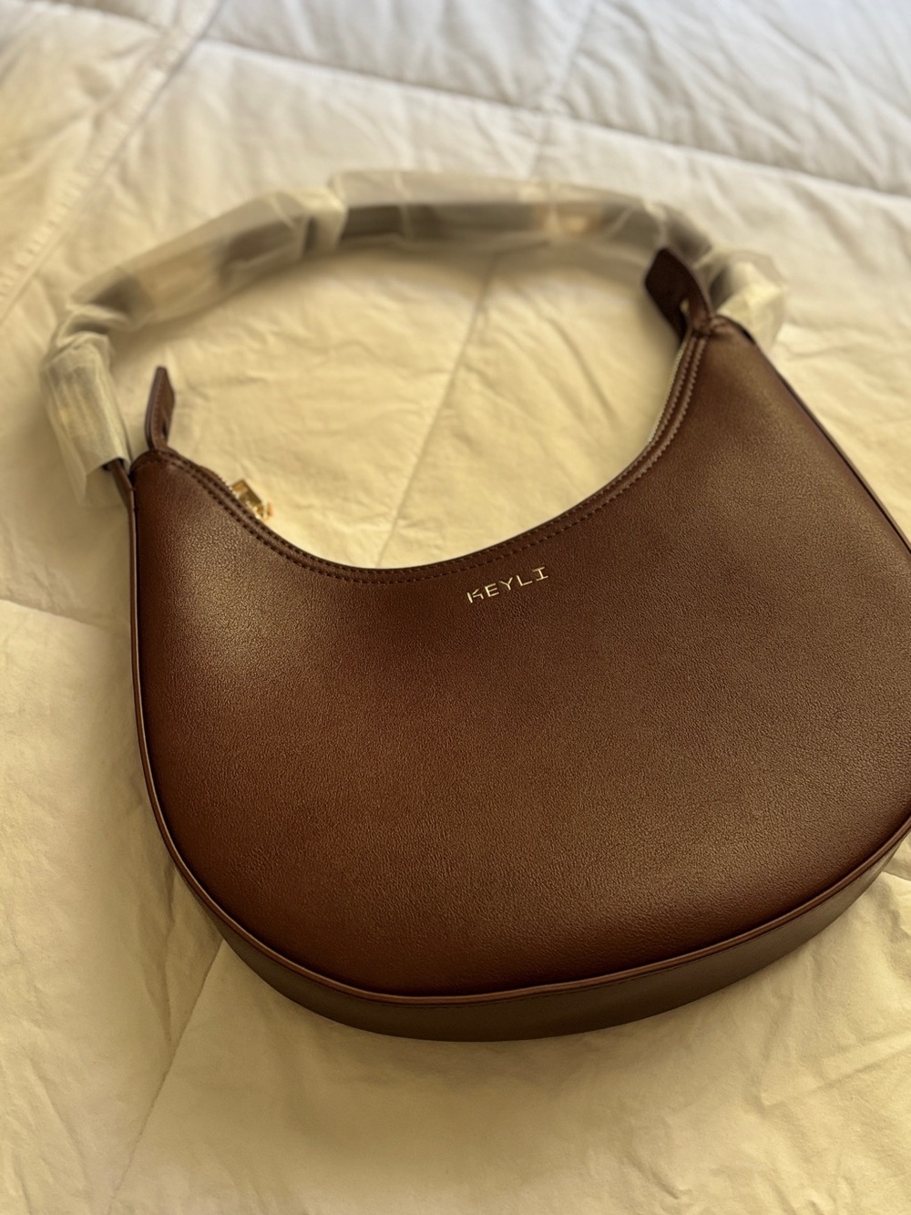 Brown Crescent Shoulder Bag with Gold Accent